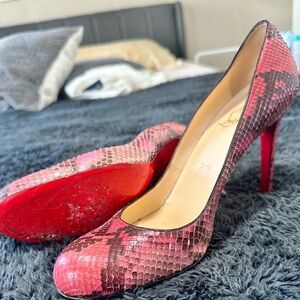 Louboutin red snake leather.  Size 38.5